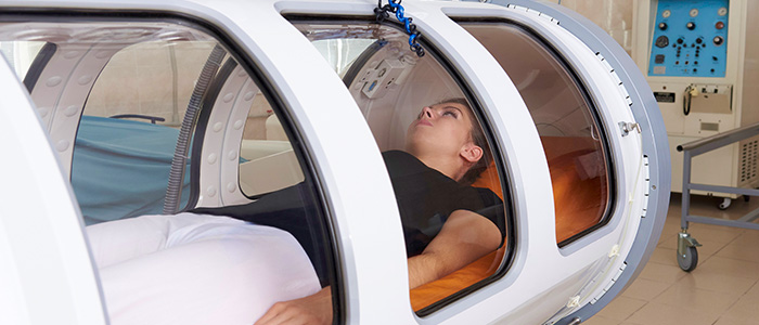 a woman in a hyperbaric chamber
